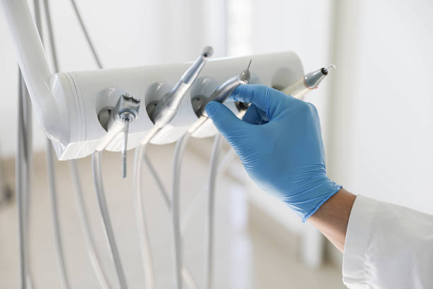 Professional Invisalign Clear Aligners technician working in Le Claire, IA